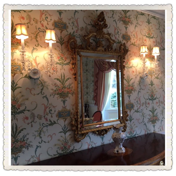 crystal sconce over buffet