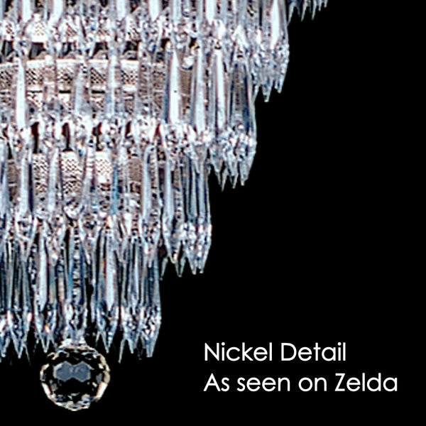 Brass detail as seen on a tier chandelier. Note the brass toned wire running through the arms.